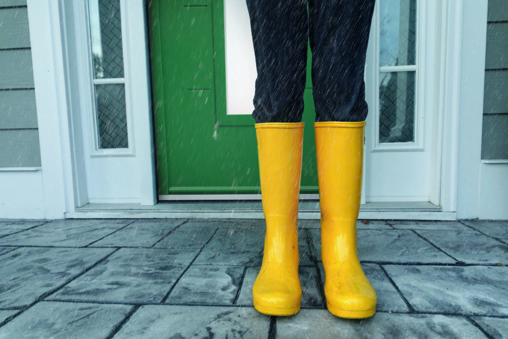 Yellow Wellies Rainboots Outside on the wet Porch while raining | Aluminium Composite Doors Smart aluminium composite doors and every aluminium composite door in our Designer range are built to be easy to care for—no sanding or sealing needed