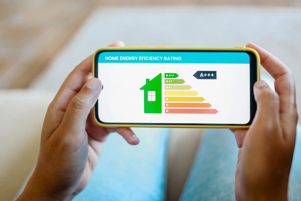 home-energy-performance-hands-hold-mobile-phone-l-2025-02-13-00-53-07-utc | Aluminium Composite Doors Stay warm with aluminium composite doors. An aluminium composite door combines sleek design with real thermal efficiency